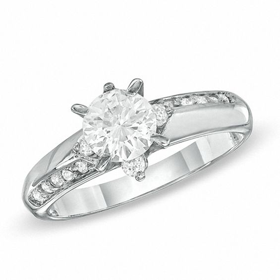 Cubic Zirconia Solitaire Alternating PavÃ© Engagement Ring in Sterling Silver - Size 7