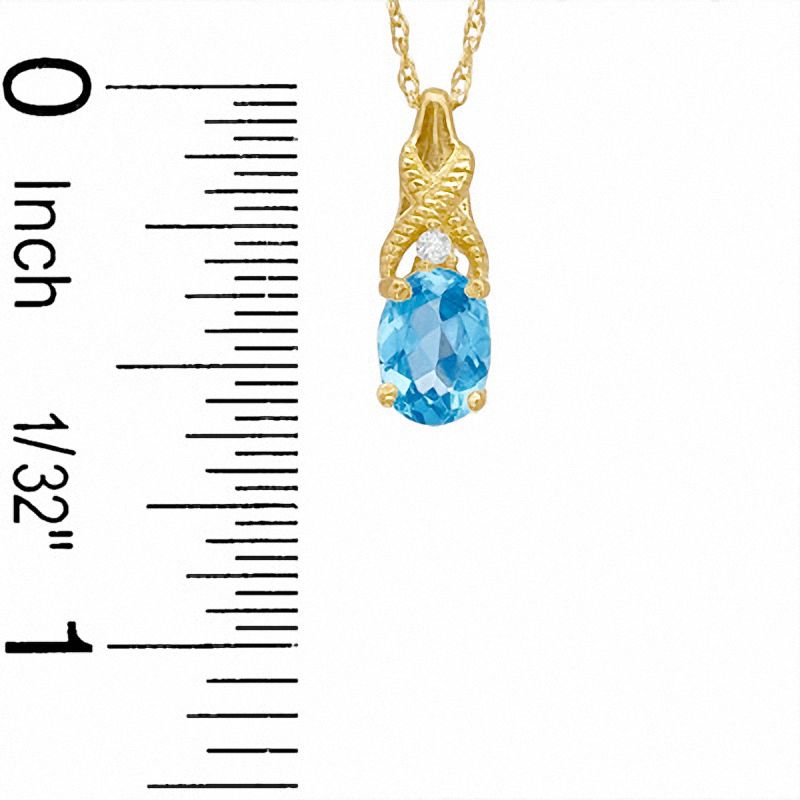 Oval Simulated Blue Topaz and CZ Pendant in Sterling Silver with 14K Gold Plate