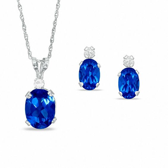 Oval Simulated Sapphire Pendant and Earrings Set in Sterling Silver with CZ