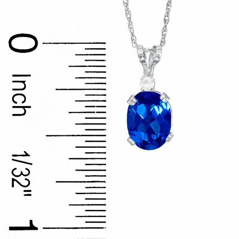 Oval Simulated Sapphire Pendant and Earrings Set in Sterling Silver with CZ