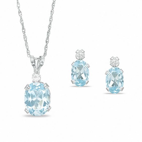 Oval Simulated Aquamarine Pendant and Earrings Set in Sterling Silver with CZ