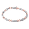 Thumbnail Image 1 of Diamond Accent Hearts Bracelet in Sterling Silver and 10K Rose Gold Plate - 7.25&quot;