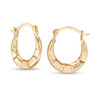 Thumbnail Image 1 of Child's Ribbed Hoop Earrings in 14K Gold