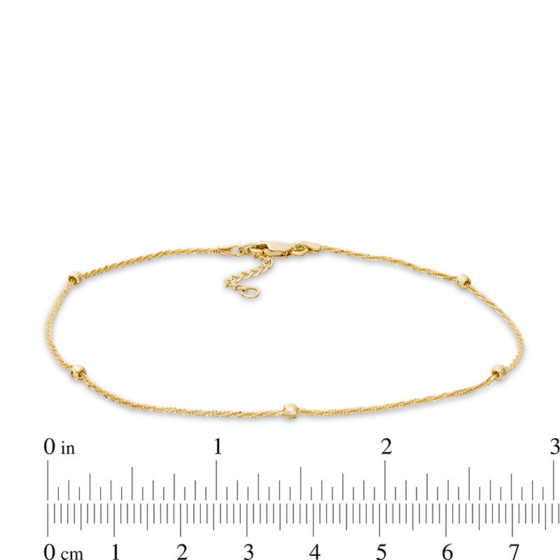 Diamond-Cut Bead Station Anklet in 10K Gold - 10"
