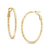 Thumbnail Image 0 of Diamond-Cut Oval Hoop Earrings in 10K Gold