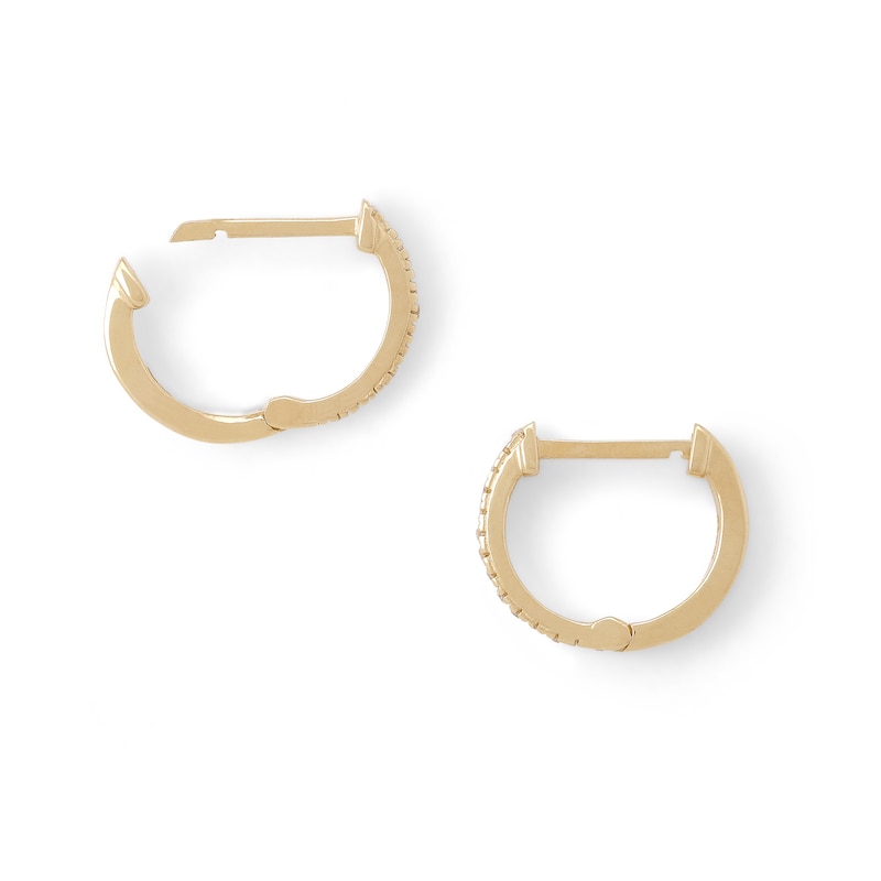 Main Image 4 of 1/20 CT. T.W. Diamond Huggie Hoop Earrings in 10K Gold