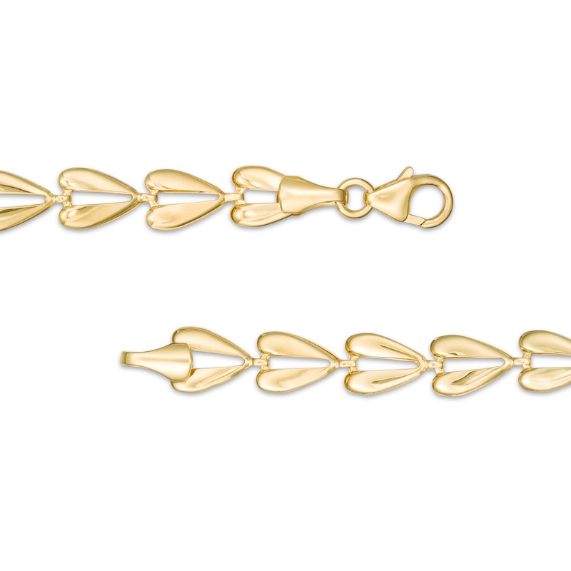 Hollow Split Hearts Stampato Bracelet in 10K Gold - 7.5"