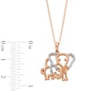 Thumbnail Image 3 of 14K Rose Gold Plated 1/20 CT. T.W. Diamond Two Elephant Pendant - 18&quot;